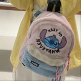 Person wearing a yellow raincoat with a plush backpack featuring a cartoon character, standing in a store.