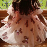 Robe rouge festive à paillettes pour petite fille