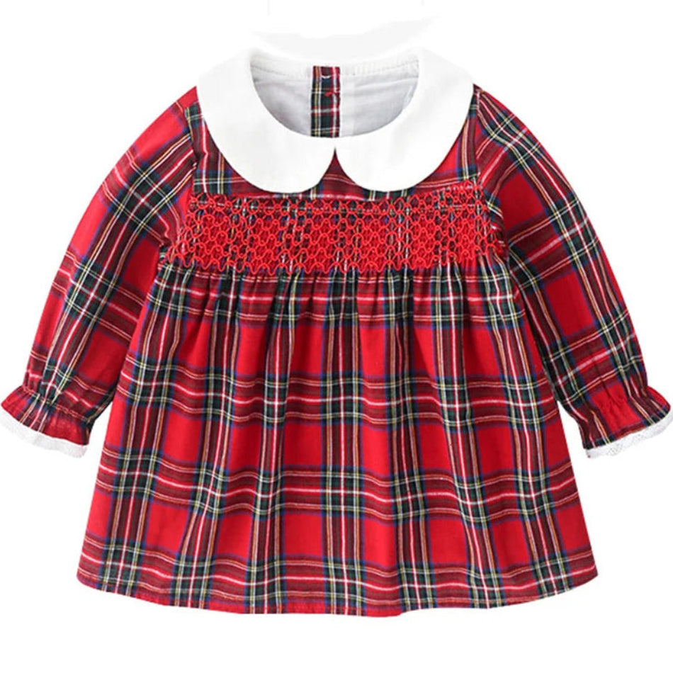 Red plaid dress with white collar on a white background