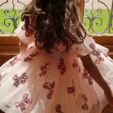 Robe rouge festive à paillettes pour petite fille