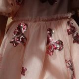 Robe rouge festive à paillettes pour petite fille