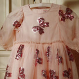 Robe rouge festive à paillettes pour petite fille